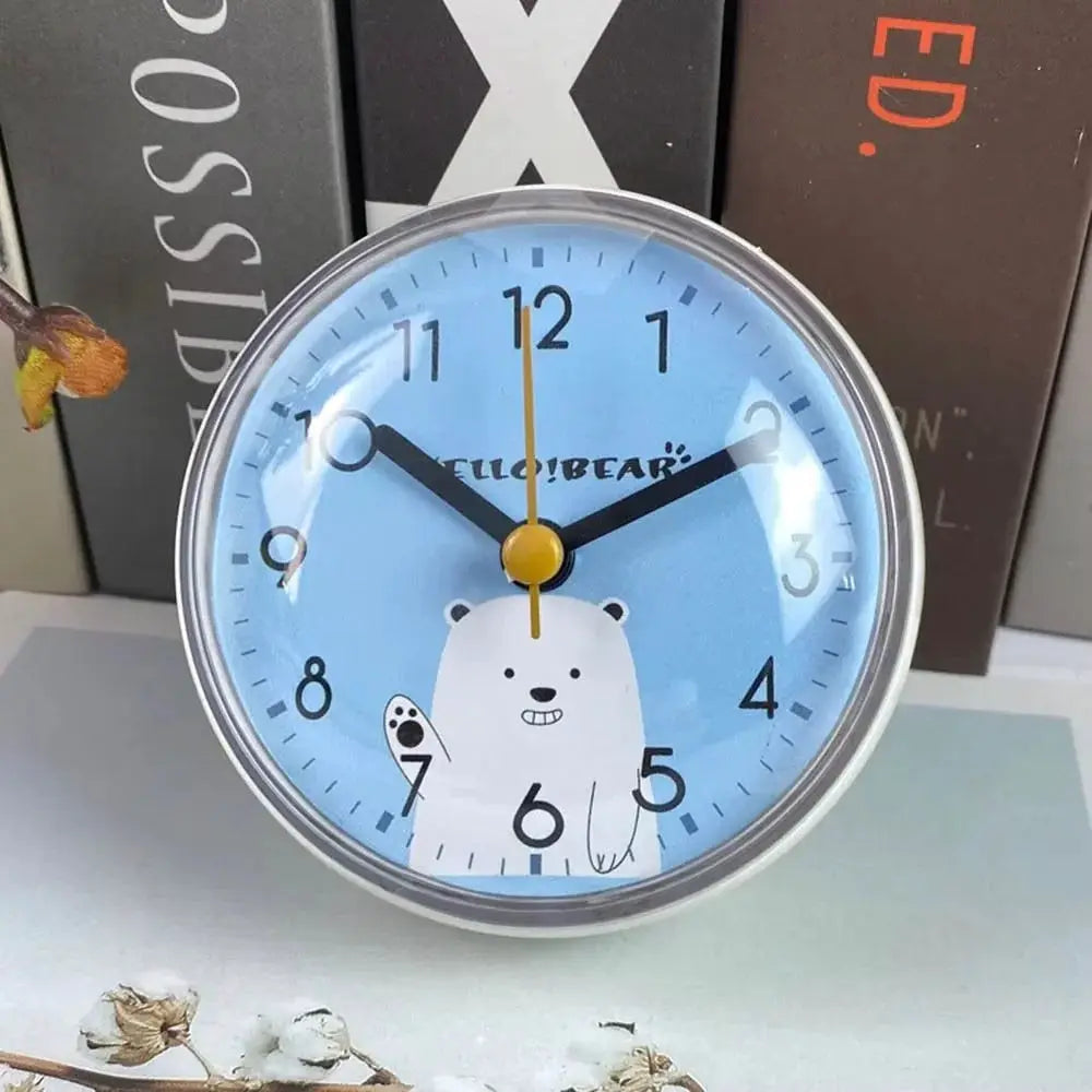 Mini suction wall clock, 7cm, blue dial with polar bear illustration.