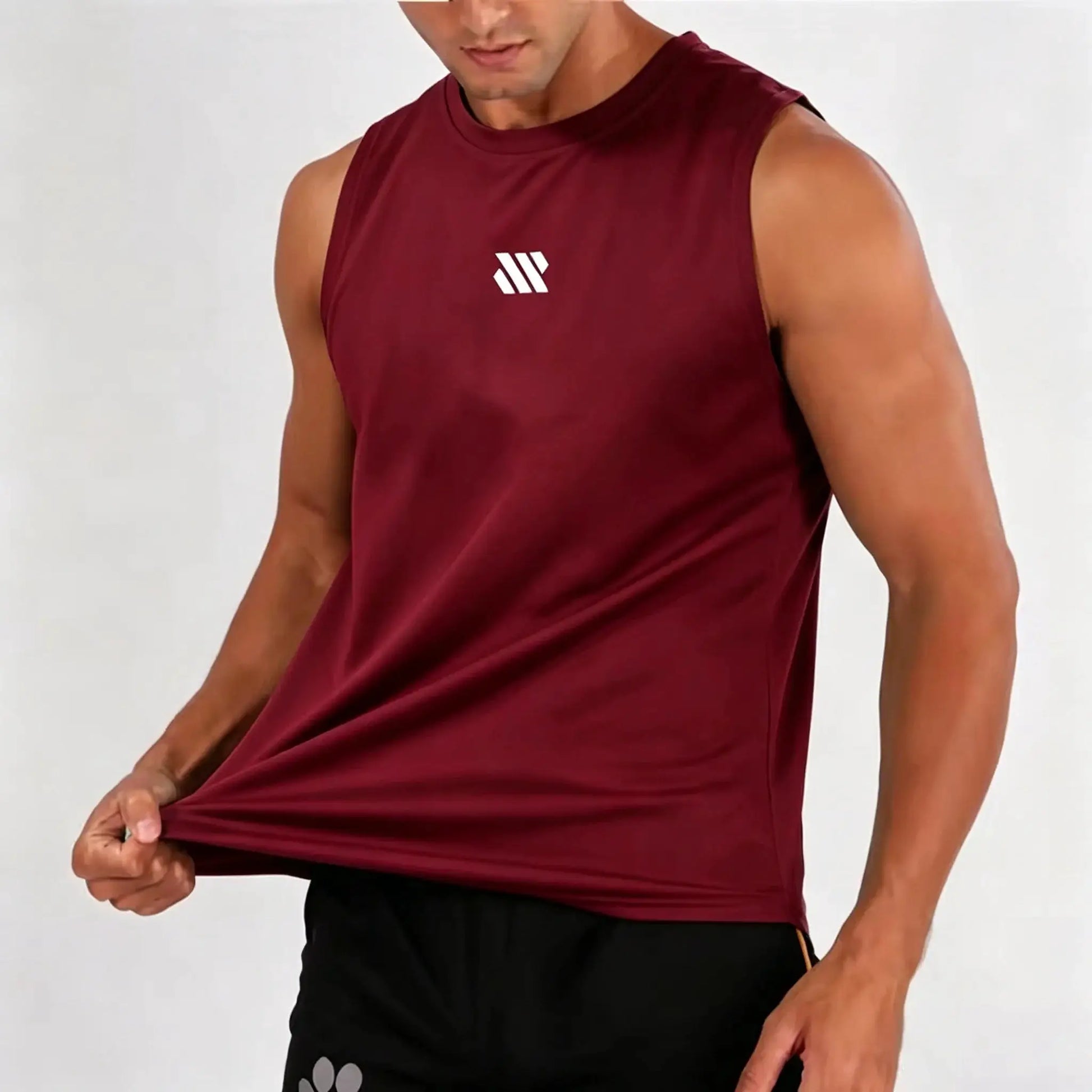 Men's maroon mesh sleeveless gym vest with white Simples Market logo.