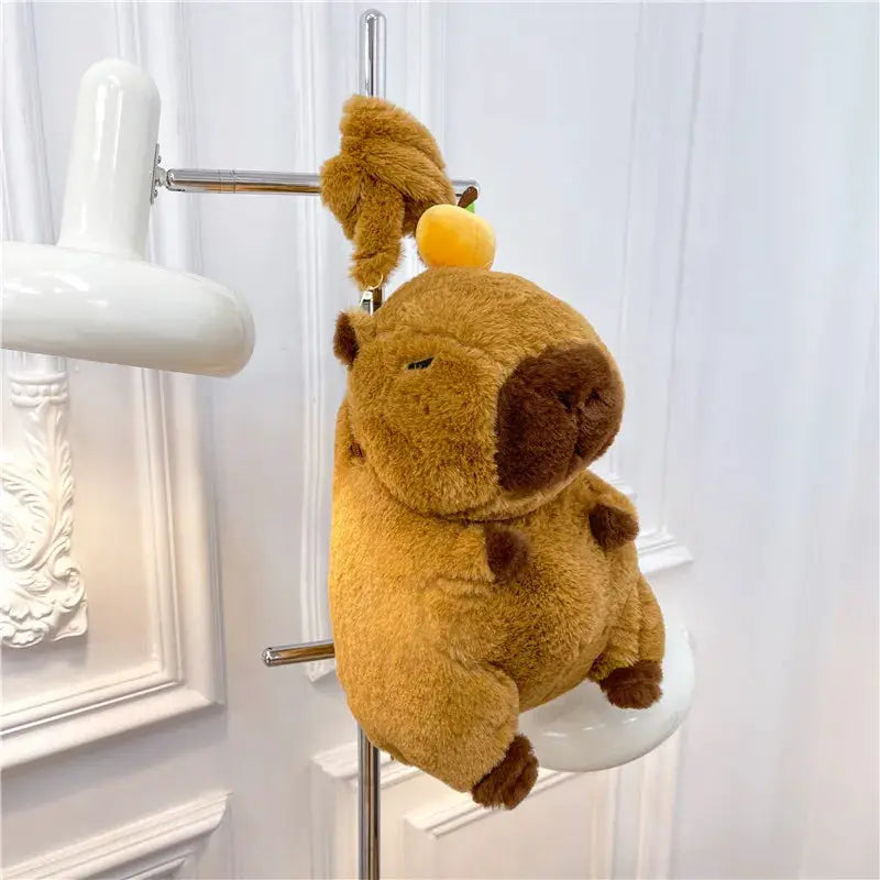 Capybara plush backpack by Simples Market, brown soft crossbody bag