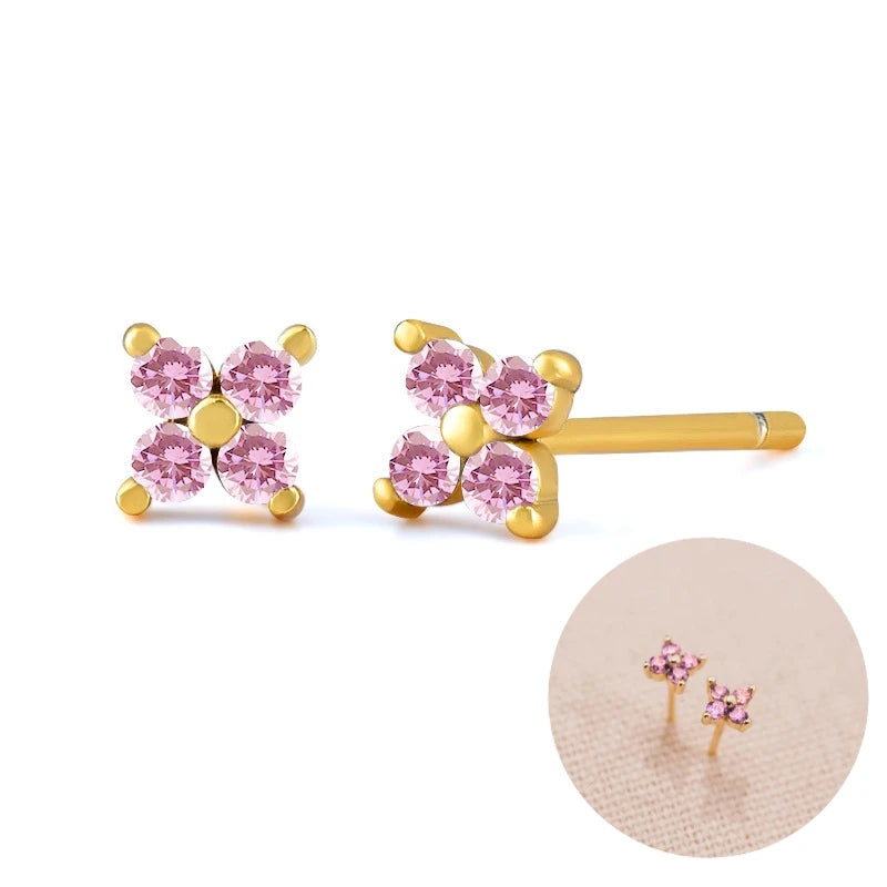 Simples Market pair of pink zircon flower earrings in gold-tone setting, four-petal design