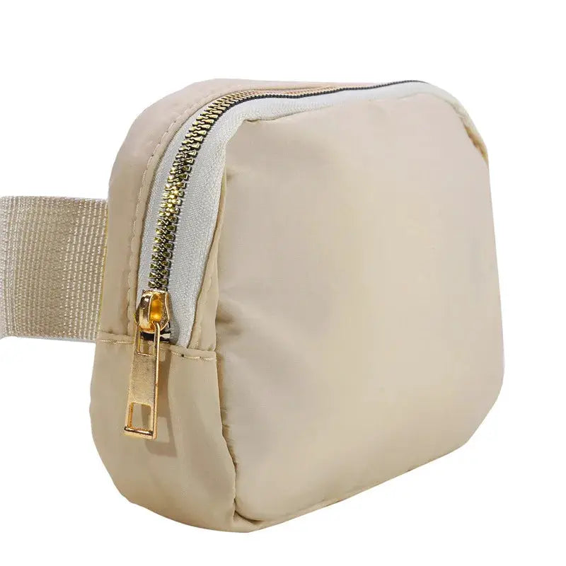 Waist bag by Simples Market, beige nylon with gold zipper and adjustable strap