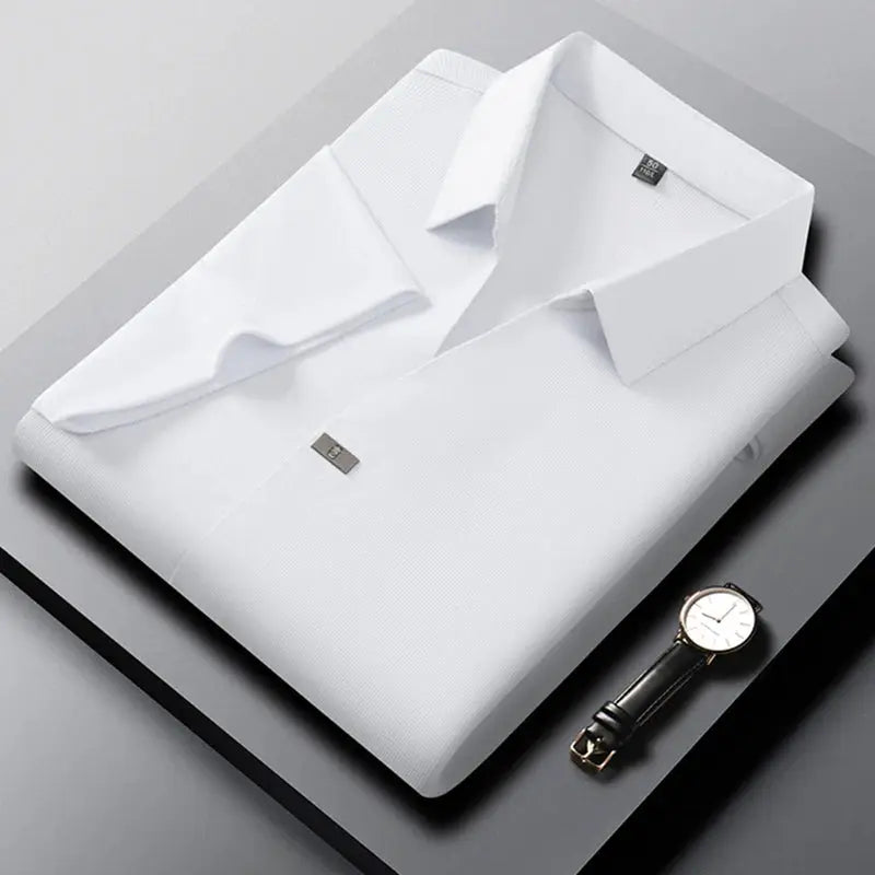 Polo shirt by Simples Market, white short-sleeve casual style folded on gray surface