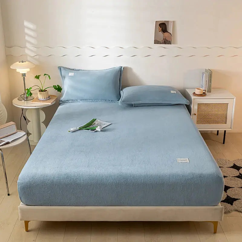 Velvet Thermal Mattress Cover, light blue plush fabric sheets by Simples Market on a bed