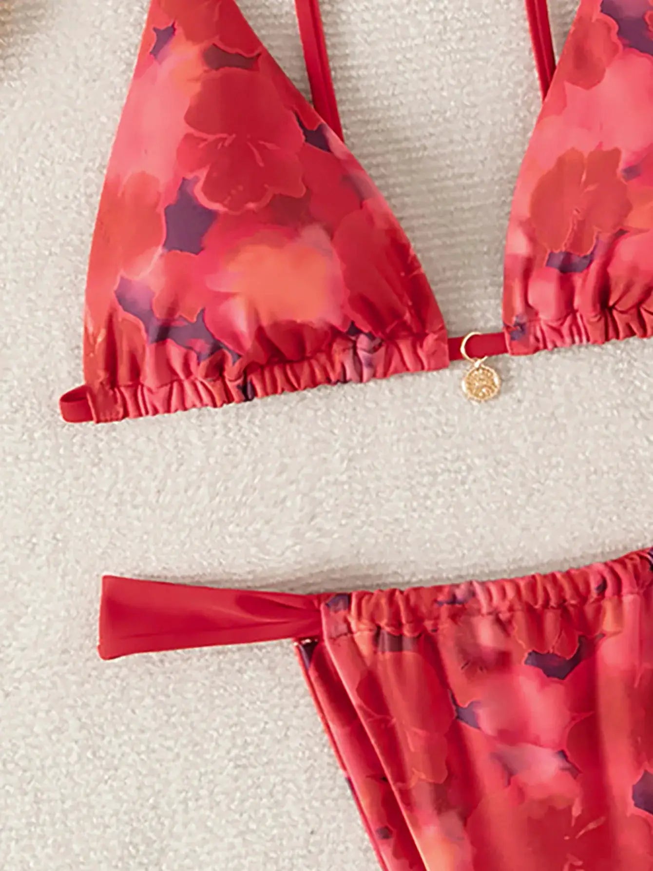 Triangle bikini set by Simples Market in red floral print with push-up top and Brazilian-cut bottoms