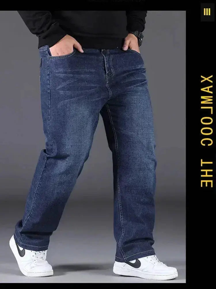 Men's oversized blue denim jeans with a loose fit.