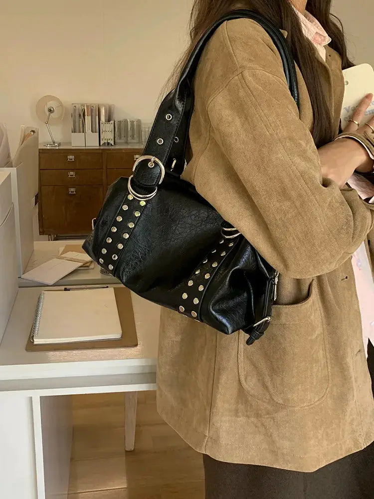 Black PU leather rivet shoulder bag for women with studded strap and metal rings