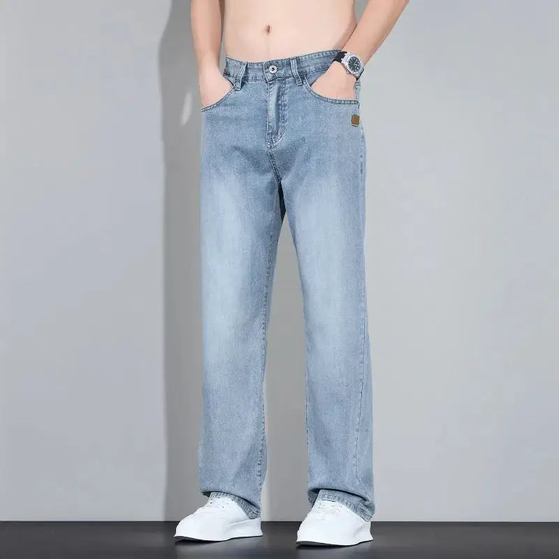Men's straight-leg denim jeans, light-wash blue with front pockets.