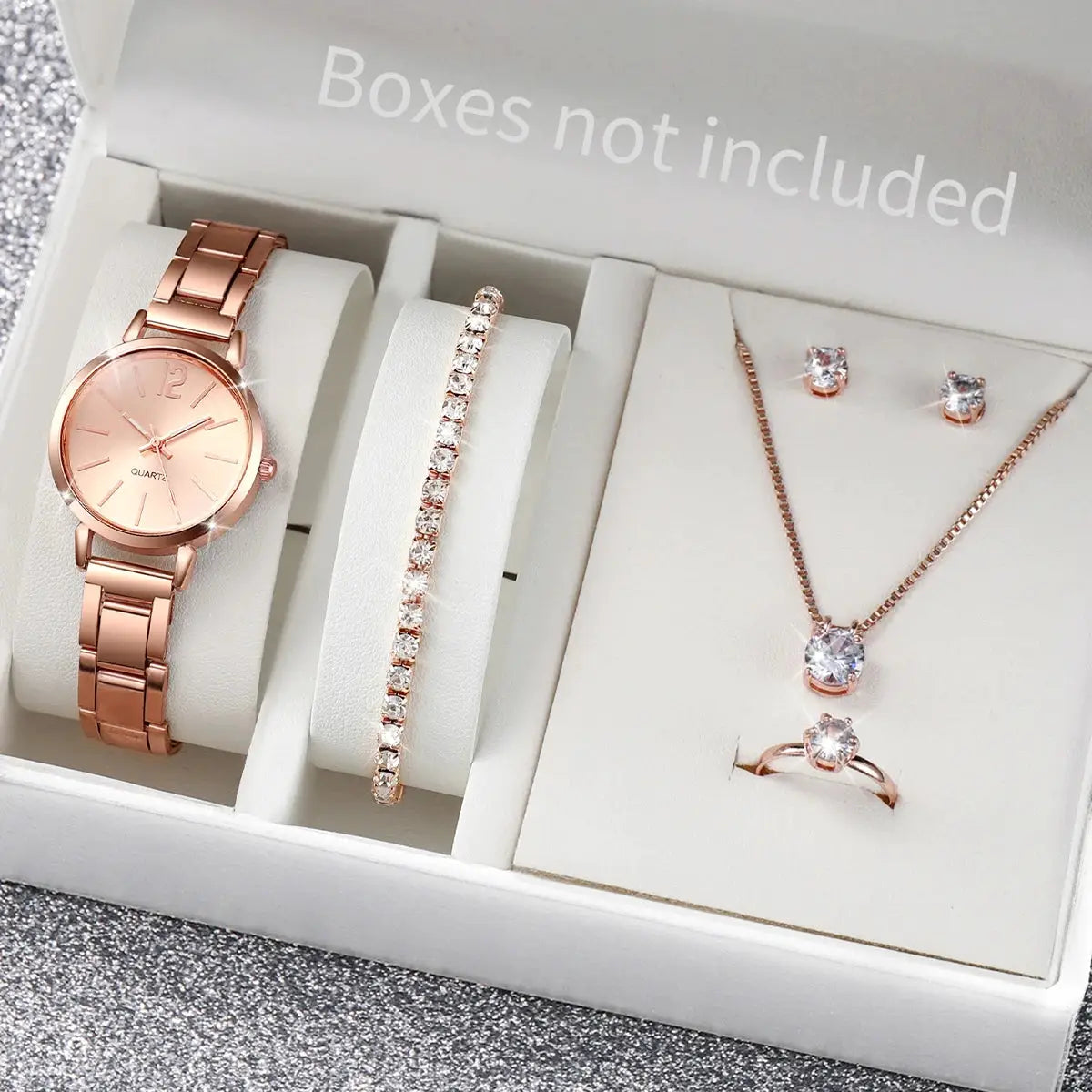Rose-gold 6-piece women's quartz watch set with stainless steel band, includes bracelet, necklace, earrings, and ring.