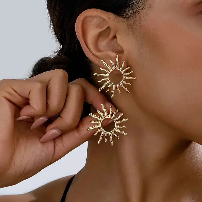 Sunburst stud earrings, gold-tone; pair for women, set of two