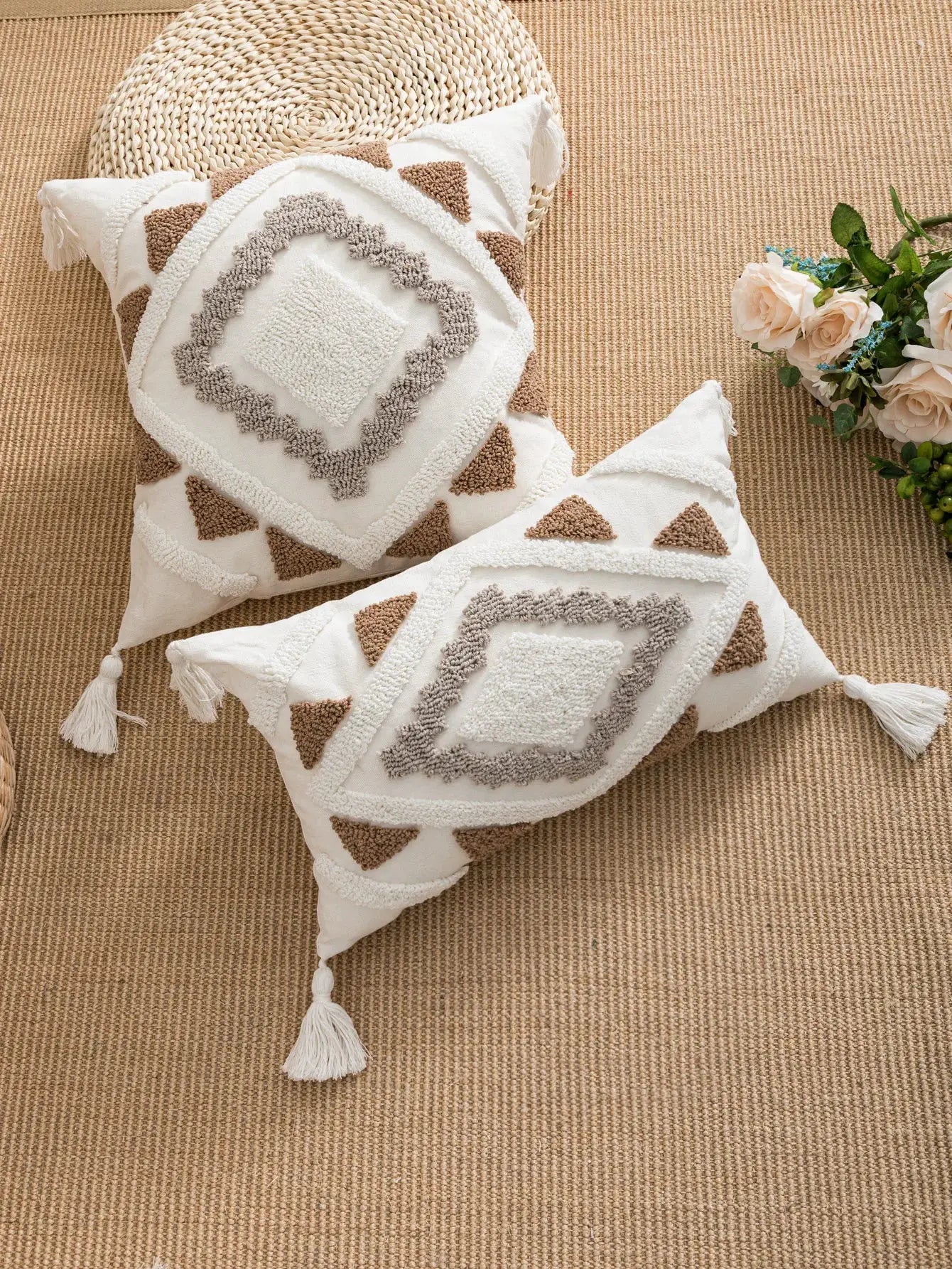 Pillow covers: white base with taupe and gray geometric patterns, bohemian loop velvet texture, tassel-edged, set of 2