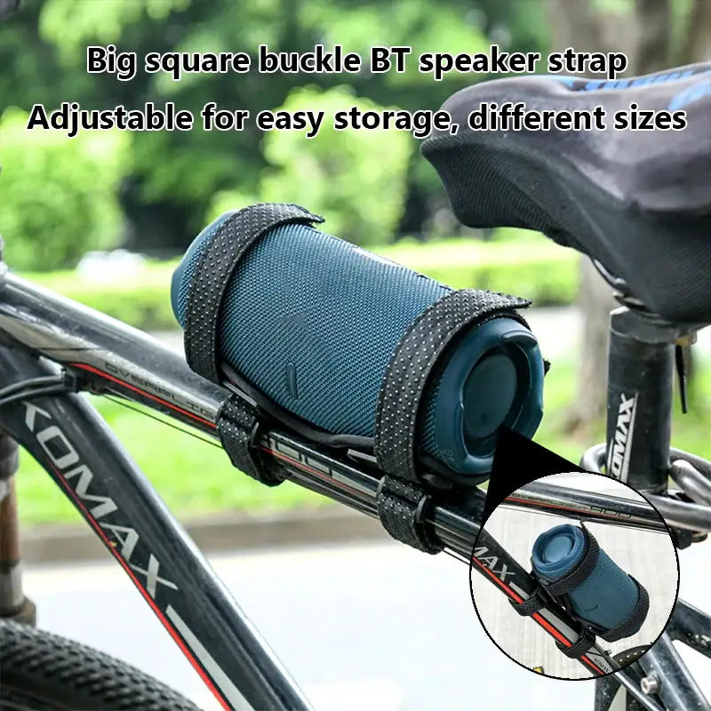 Bike speaker mount strap for JBL Flip 6; blue cylindrical speaker secured to bike frame with adjustable straps.