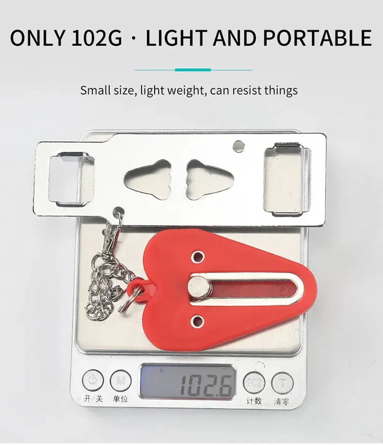 Door lock latch by Simples Market, portable red plastic with metal slider, on scale 102.6 g