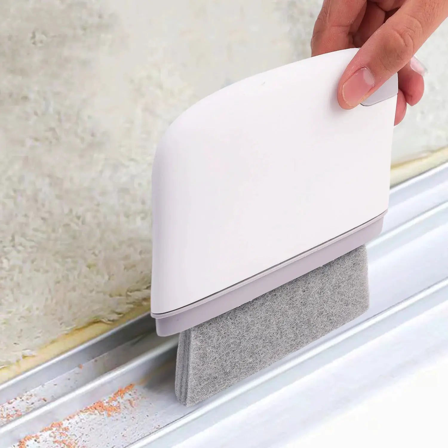 2 in 1 window rail cleaning brush with white housing and gray felt pad for tracks