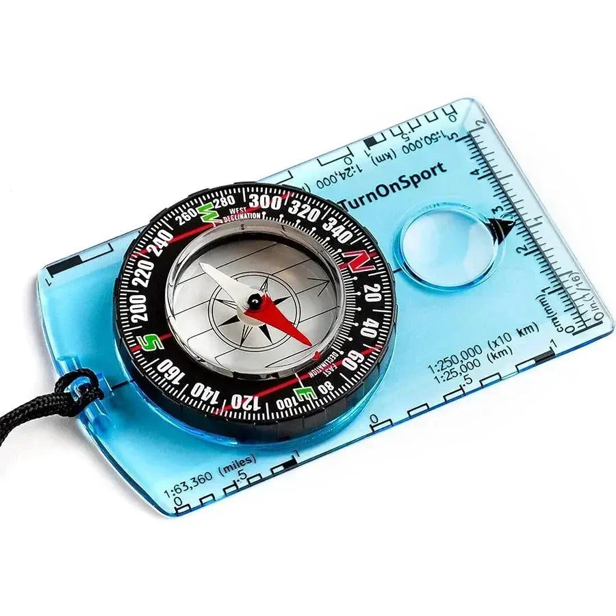 Waterproof compass outdoor navigation gadget in blue translucent housing with ruler, lanyard