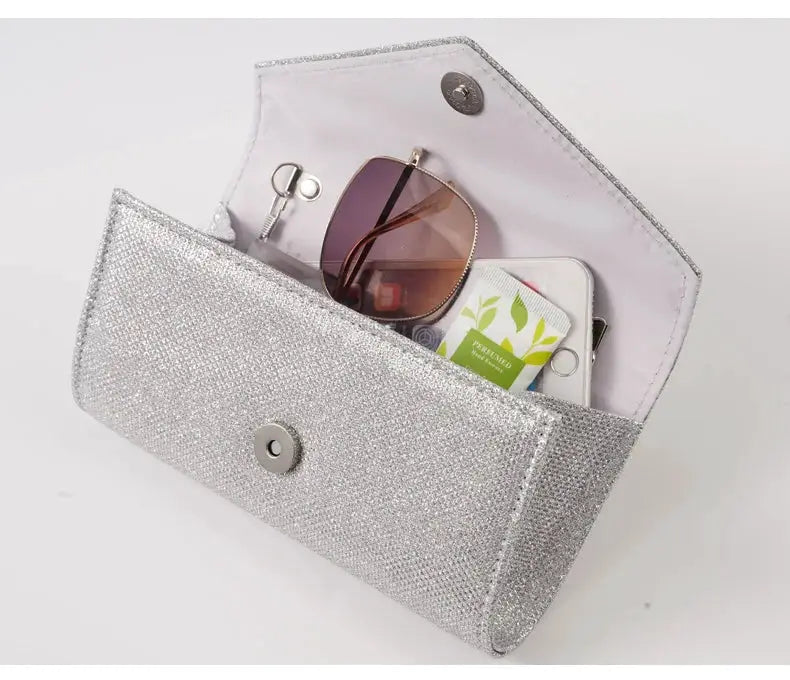 Women's silver glitter envelope clutch bag with chain strap by Simples Market