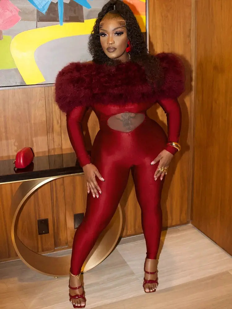 Sisterlinda red furry slash-neck jumpsuit with midsection cutout, form-fitting full-body overalls with red strappy heels