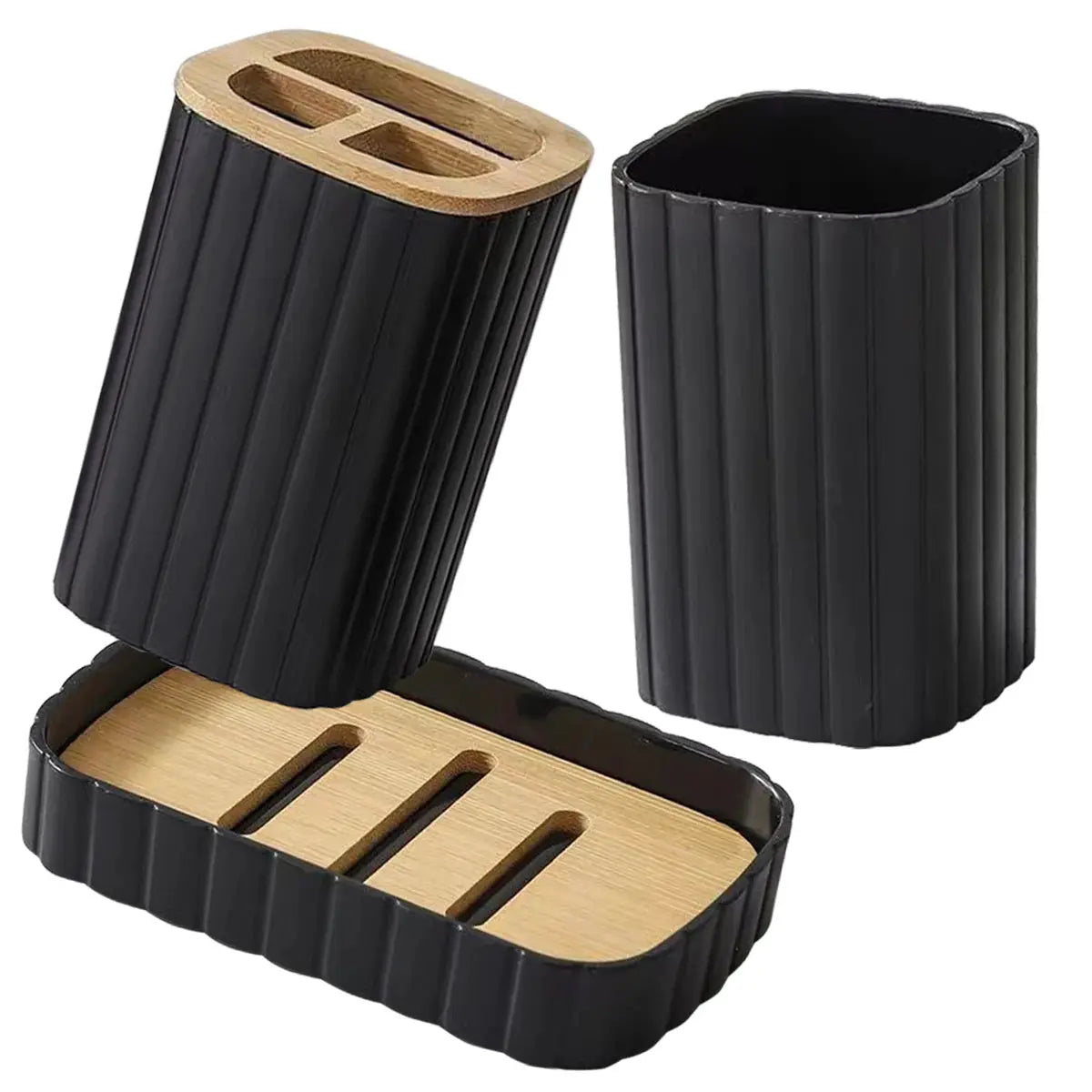 4-piece bathroom set in black ribbed plastic with wood accents; includes dispenser, toothbrush cup and soap holder.