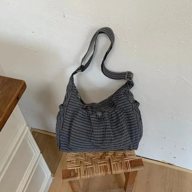 Korean nylon plaid shoulder bag with drawstring closure and adjustable crossbody strap