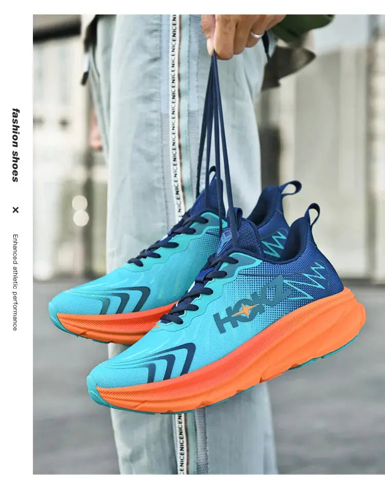Men's running shoes by Simples Market with breathable mesh in turquoise and navy, bright orange sole