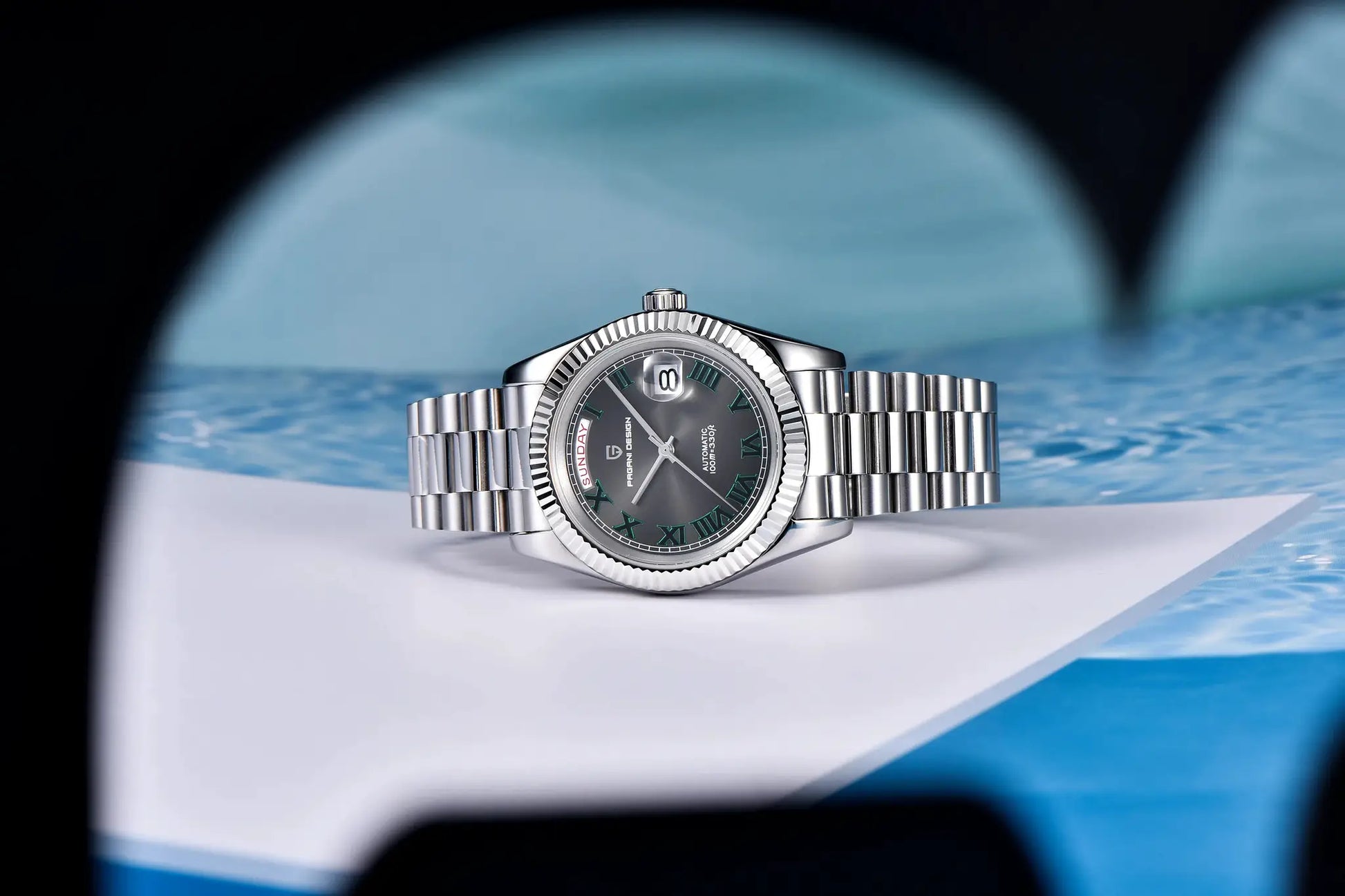 Pagani Design men's luxury automatic watch with silver stainless steel bracelet, fluted bezel, gray dial and date window