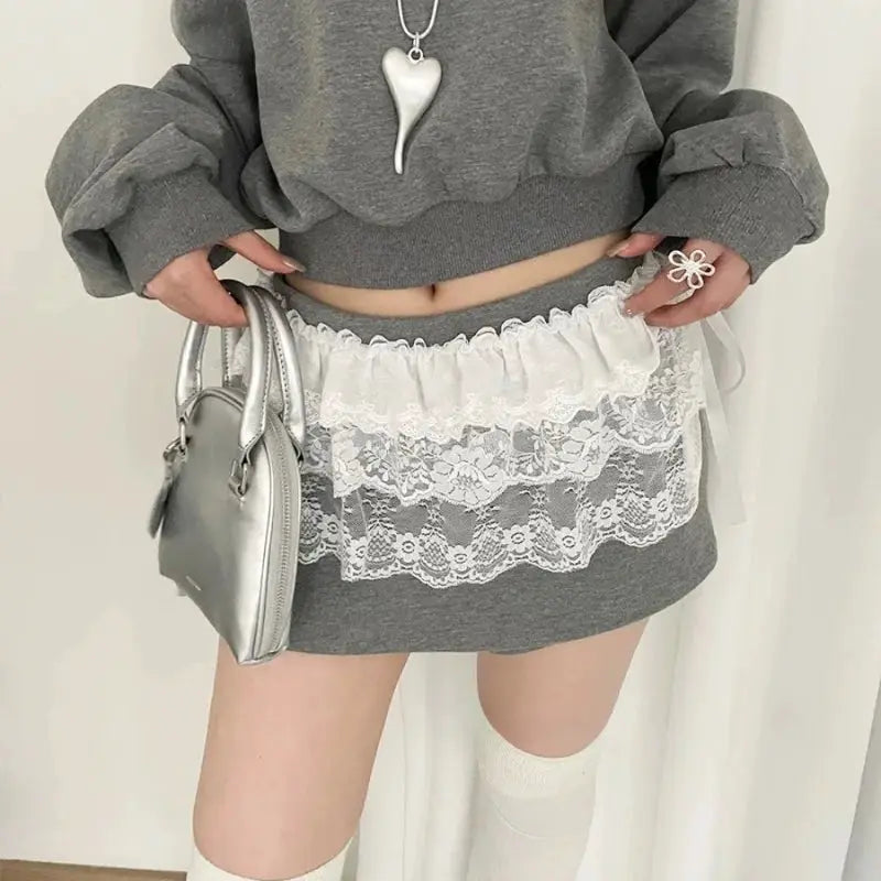 Women Y2K lace mini skirt with white lace overlay on grey knit, high-waist