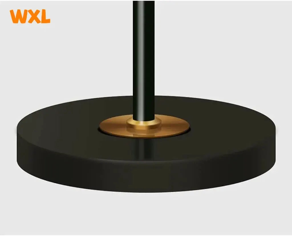 Floor lamp, black round base with gold collar around the pole, WXL brand