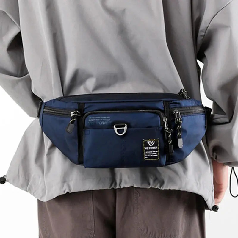 Men's navy nylon waist fanny pack by Simples Market with multiple pockets and zip closures.