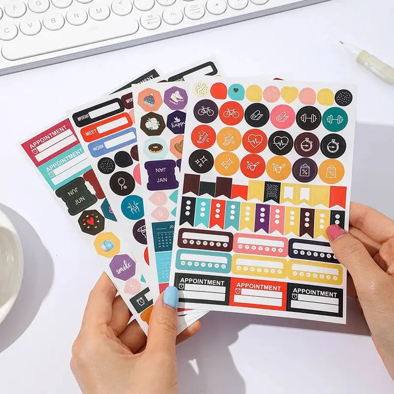 Simples Market planner sticker sheets (3) with colorful icons and appointment labels for 2026 calendar
