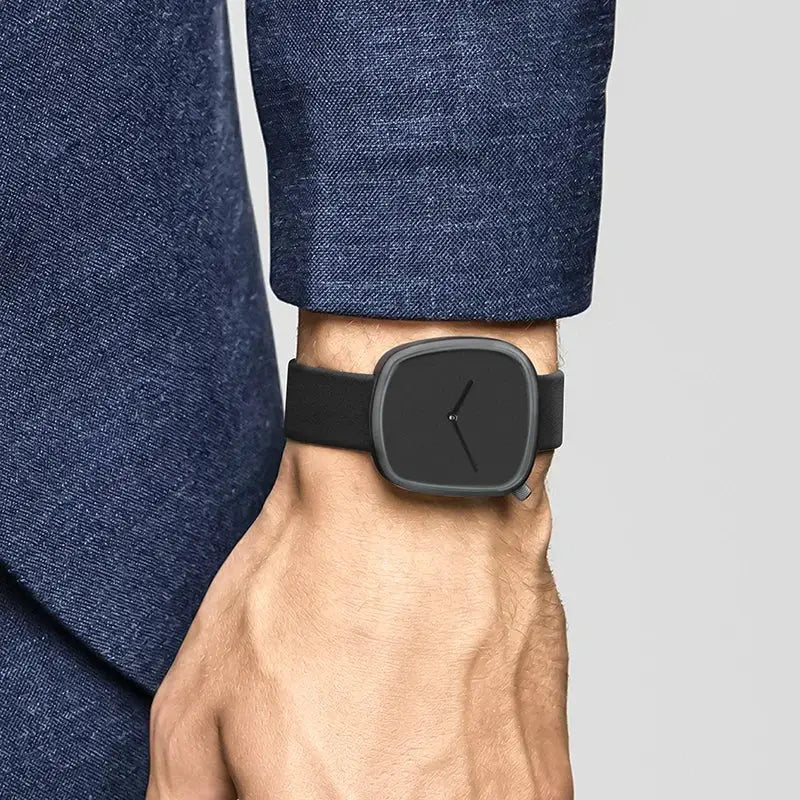 TOMI Watch by Simples Market; minimalist square design with black strap and gray case.