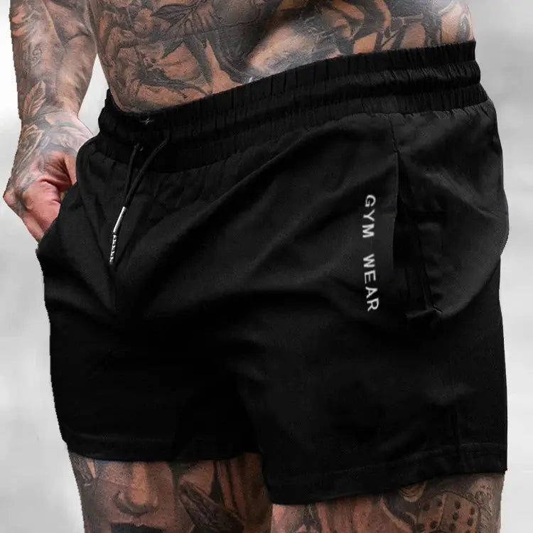 Men's black gym shorts with drawstring, quick-drying, side pocket, GYM WEAR logo.