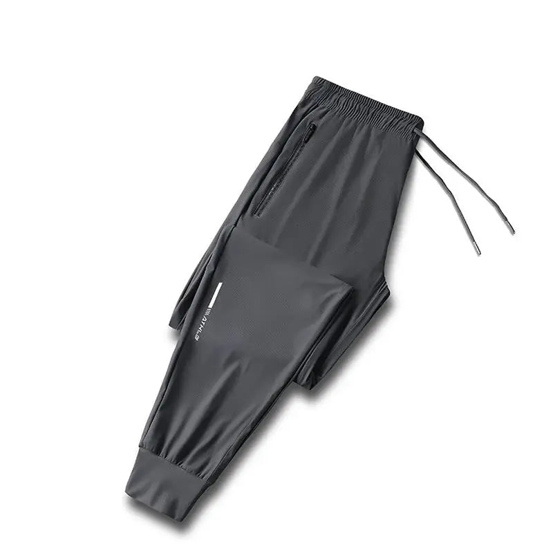 Simples Market ice silk men's pants, charcoal gray quick-dry joggers with elastic waistband and zip pocket.