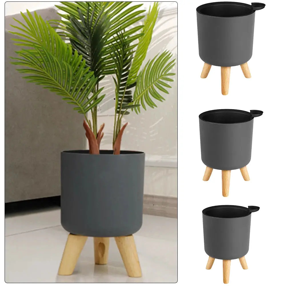 Floor-standing round plant pot with wooden legs by Simples Market; gray planter with self-watering drainage, 4-pack.