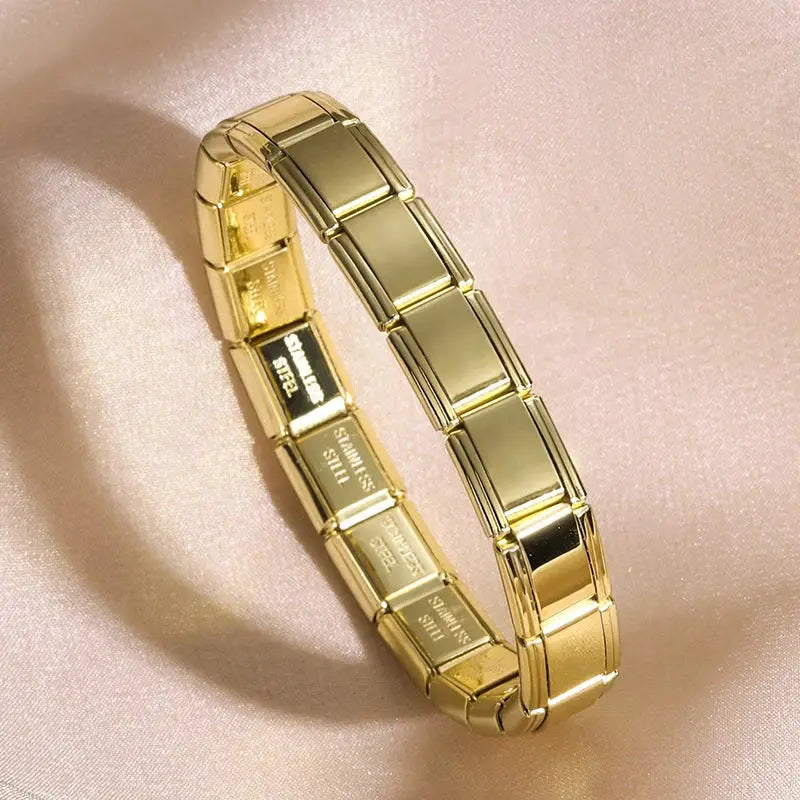 Gold-tone stainless steel unisex bracelet, 9mm wide, Simples Market elastic modular jewelry.