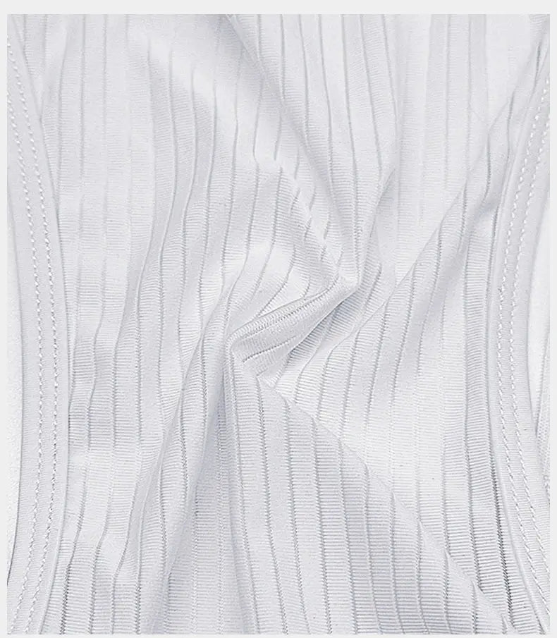 INBIKE men's cycling bib shorts white ribbed fabric close-up; breathable material.