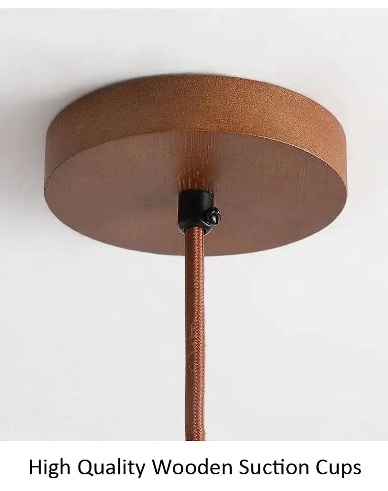 Wabi Sabi circular yellow stone LED pendant lamp with brown canopy and braided cord