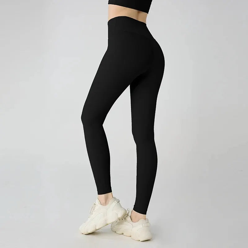 Women's high-waisted yoga leggings by Simples Market, black breathable fabric