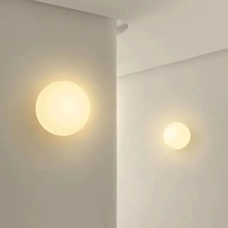 Milky white glass ball wall lamp by Simples Market; frosted round wall light with warm glow (set of 2)