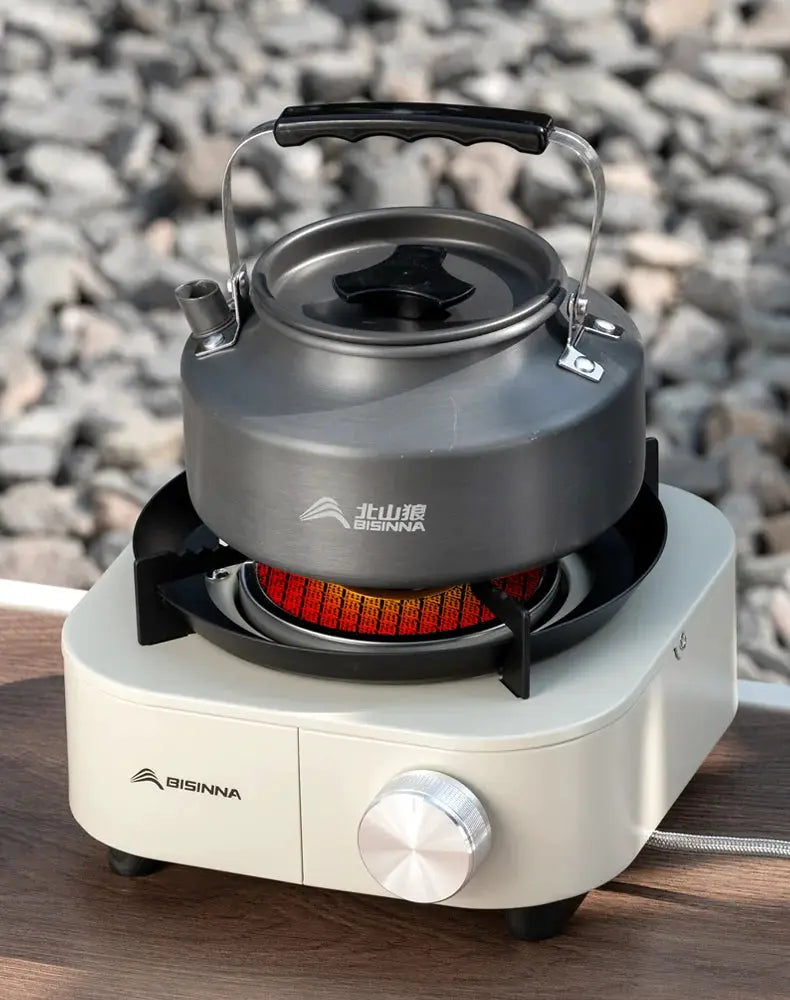 BISINNA 4000W portable gas stove with stainless steel kettle on beige base for outdoor camping