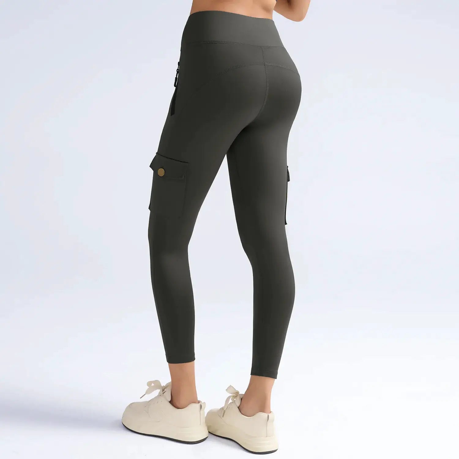 Leggings by Simples Market in dark olive with cargo pockets, flap and side zipper