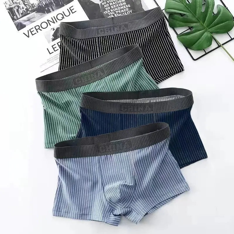4-pack men's striped cotton boxer shorts with dark waistbands in black, green, navy, and light blue.