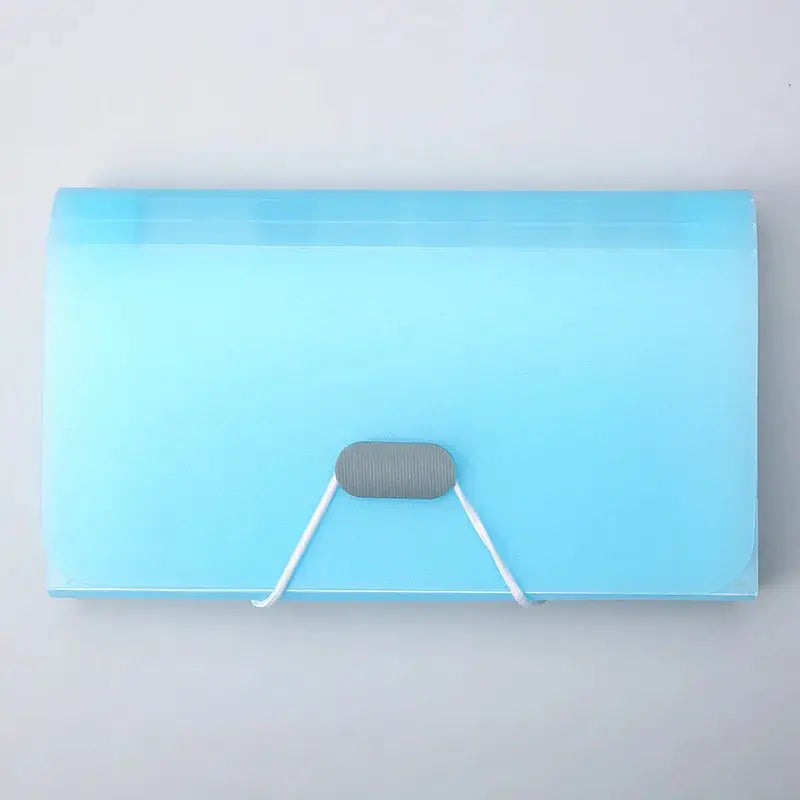 Simples Market A6 expanding file folder in light blue with buckle latch and elastic strap for documents