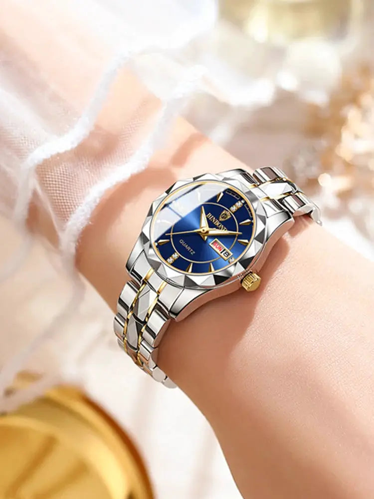 BINBONG Women's luxury quartz watch with blue dial, date display, and two-tone stainless steel bracelet