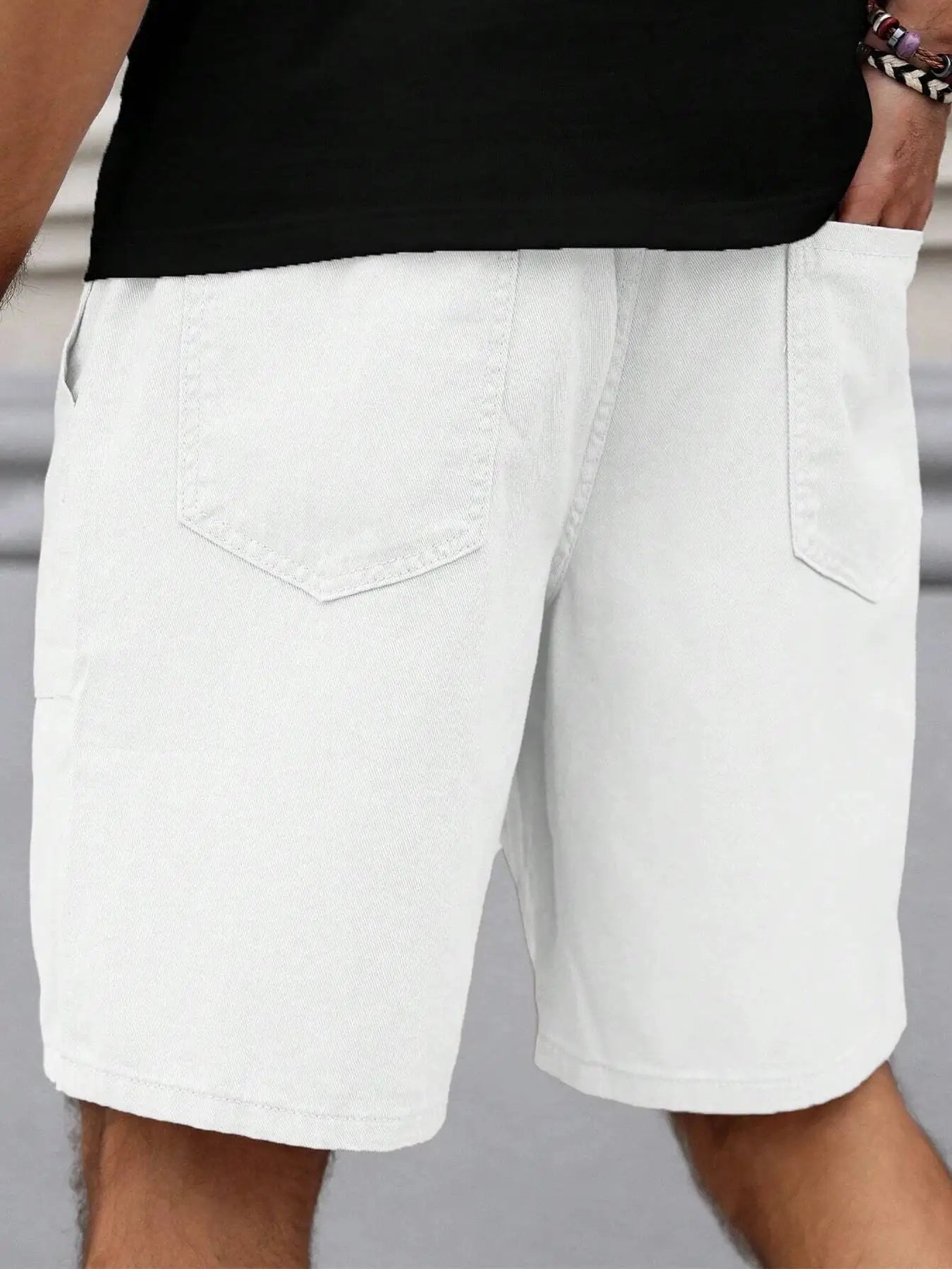 Men's mid-length light gray shorts with back pockets for casual summer wear