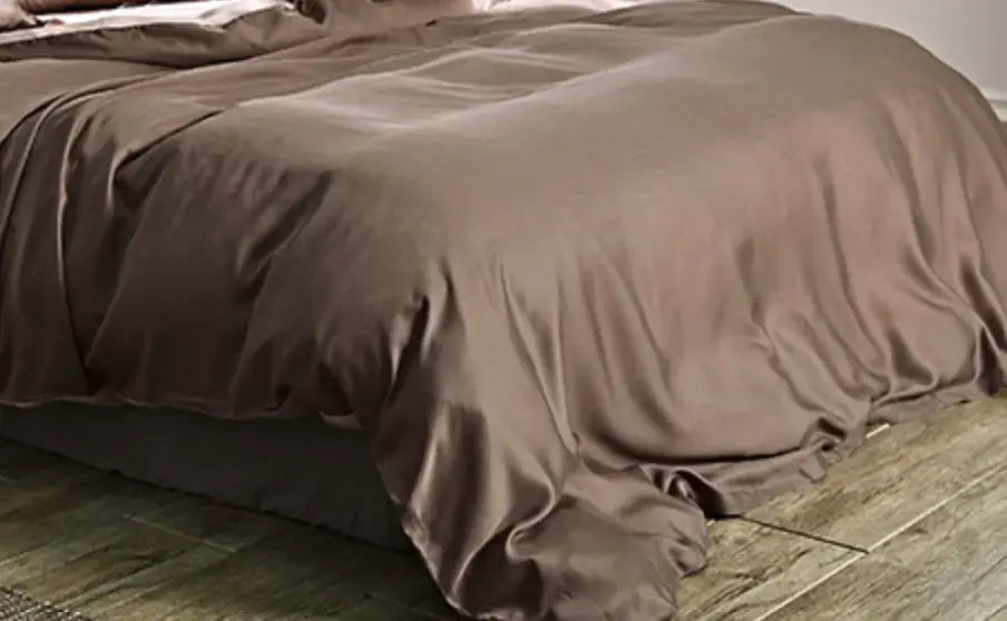 Eucalyptus Lyocell duvet cover in taupe on a bed with smooth cooling fabric.