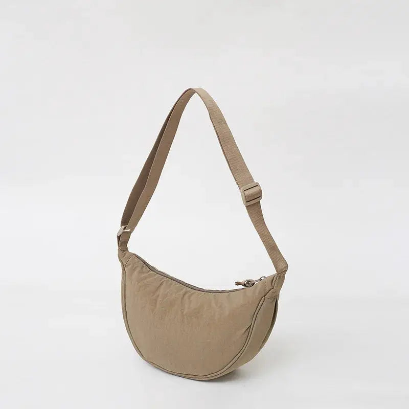 Nylon crossbody bag Simples Market, beige crescent-shaped dumpling bag with large capacity.