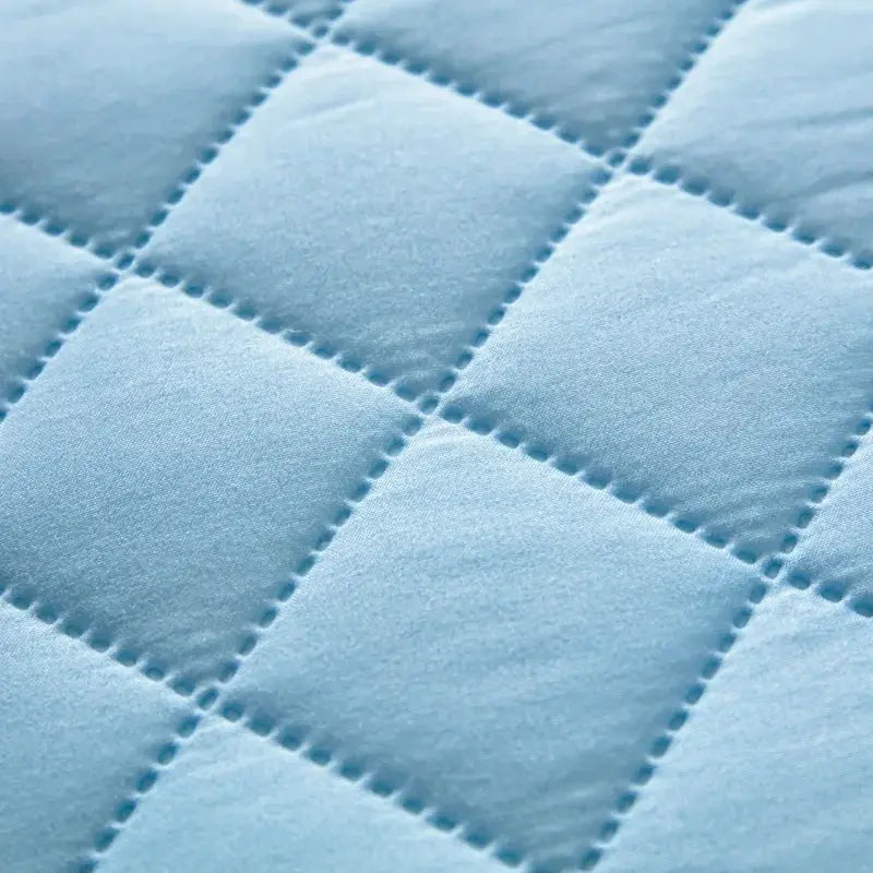 Quilted cotton pillowcase by Simples Market, light blue with square pattern; waterproof, anti-mite, antibacterial.