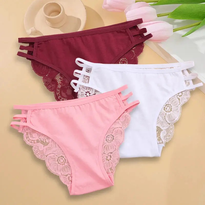 3pc lace panties set by Simples Market in burgundy, white, and pink with floral lace trim and triple side straps