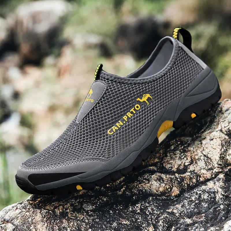 Men's gray mesh outdoor slip-on sneakers with rugged outsole and yellow accents.