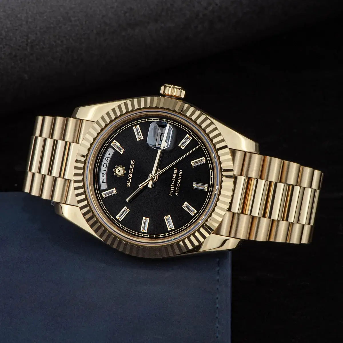 Sugess men's 40mm gold-tone automatic watch with day/date display, black dial, sapphire crystal