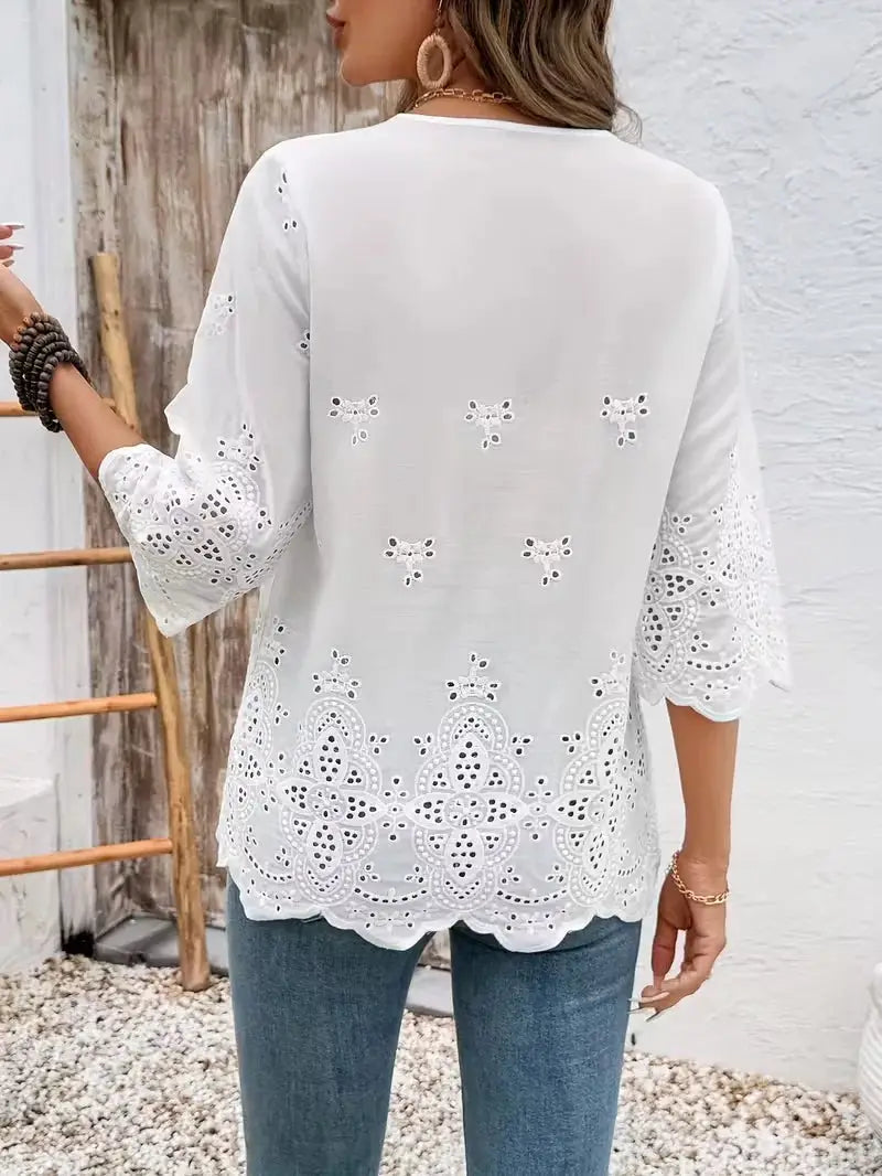 Temperament Loose Woman Shirt, white long-sleeve blouse with eyelet lace embroidery.